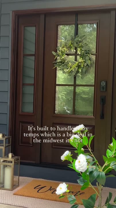 Reel by @mapledrivedesign: Mocha-brown fiberglass door with six glass panes and sidelights on a dark grey house.