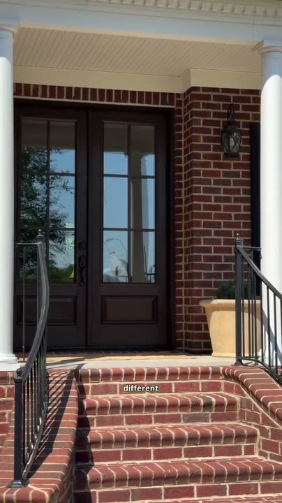 Reel by @sonelymateo: Brown pecan-stained double front doors with six glass panes each, seen from a bright hallway.